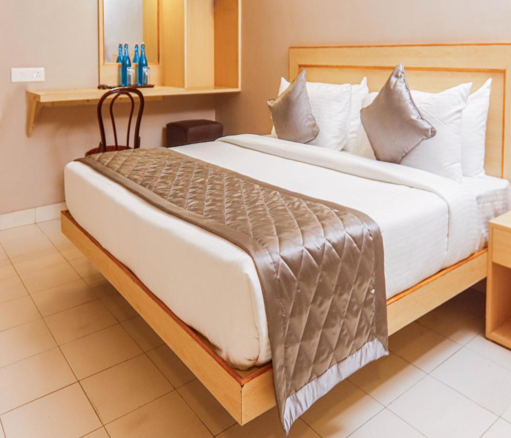 Hotel Vinayaga Tiruppur Extérieur photo