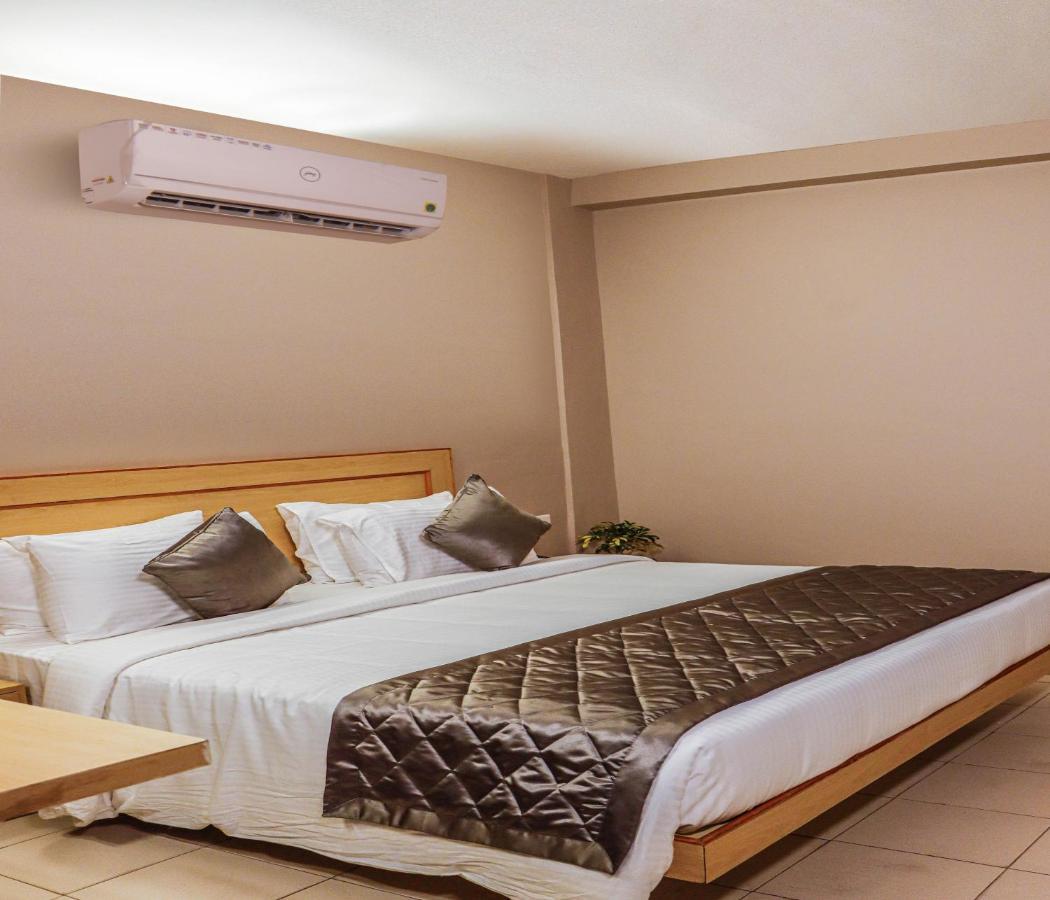 Hotel Vinayaga Tiruppur Extérieur photo